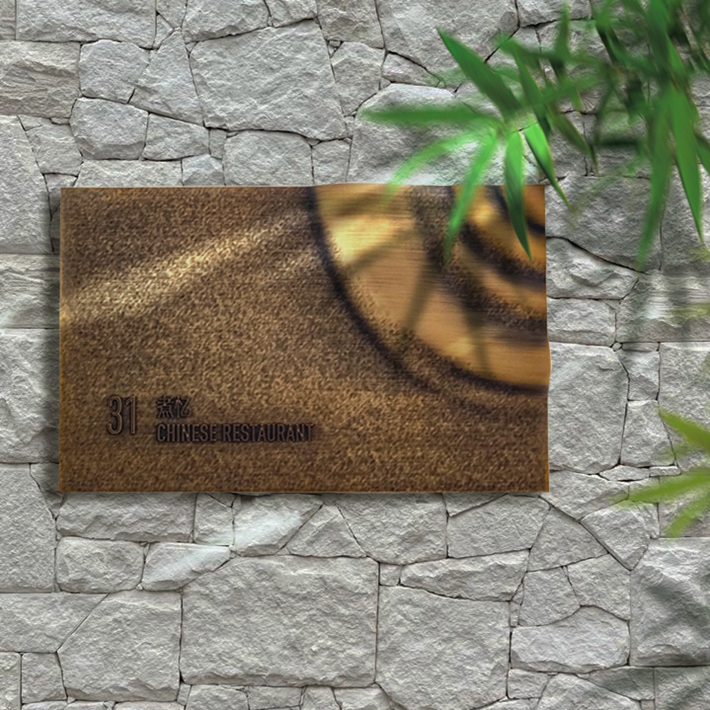 Metal relief plaque